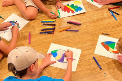 Group-of-young-boys-coloring-in-a-circle-copy
